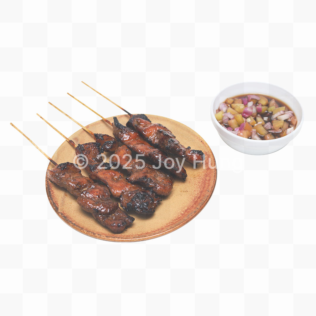 Skewered grilled meat on a wooden plate with a small bowl of side dish on a transparent background cut out PNG.