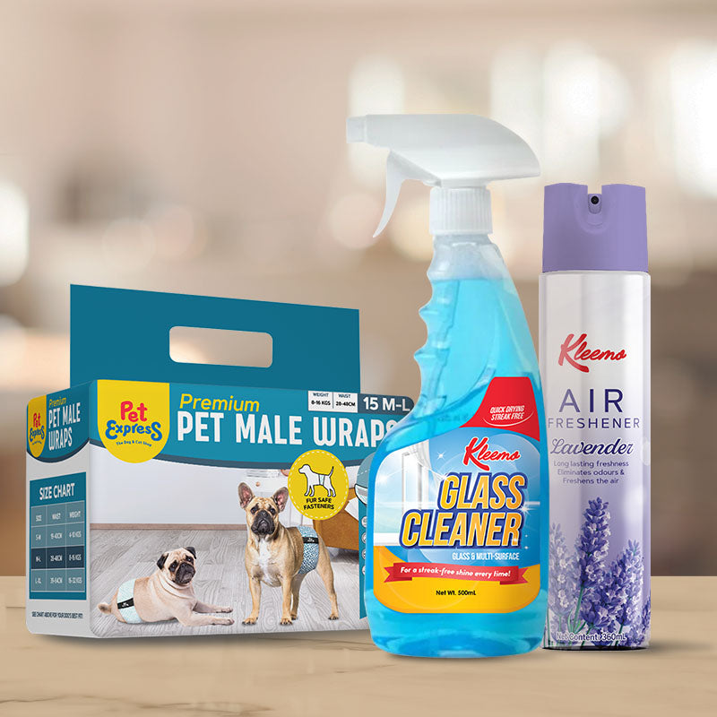 Three cleaning products including a glass cleaner, air freshener, and wraps on a wooden surface with a blurred background.