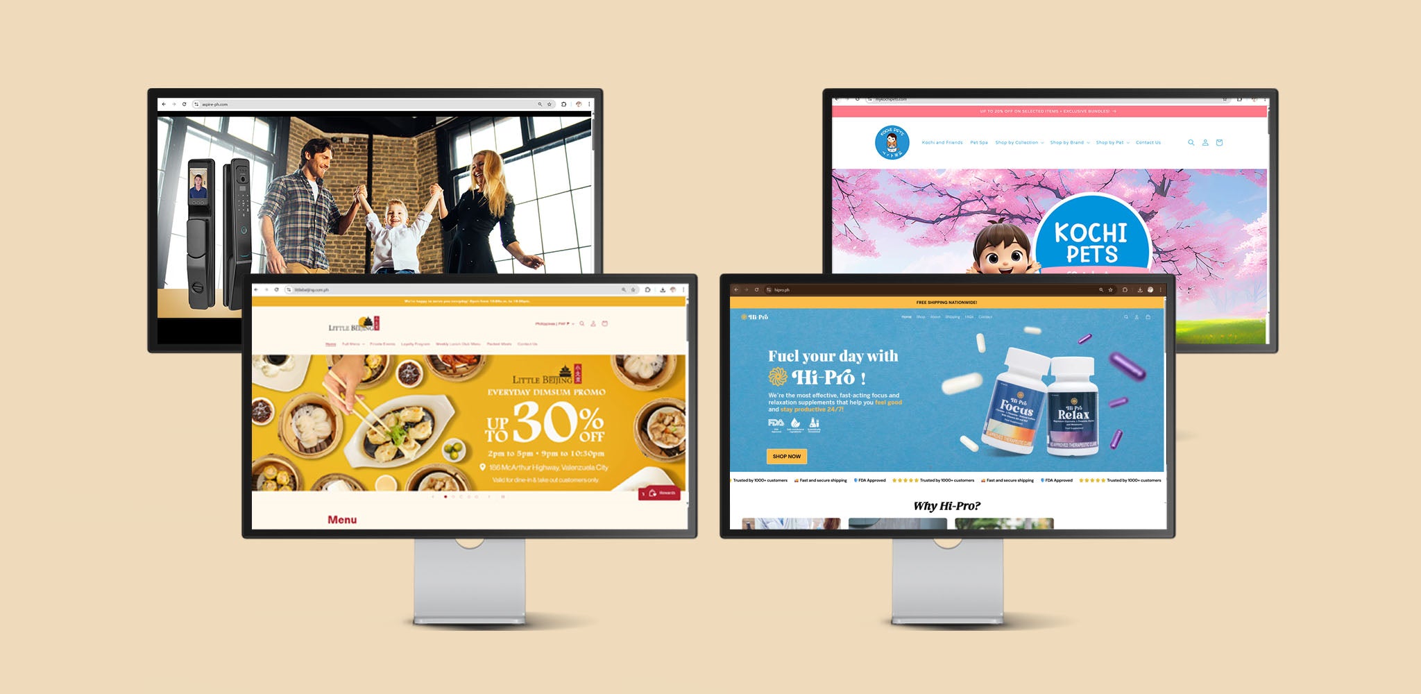 Four computer monitors displaying different websites on a beige background